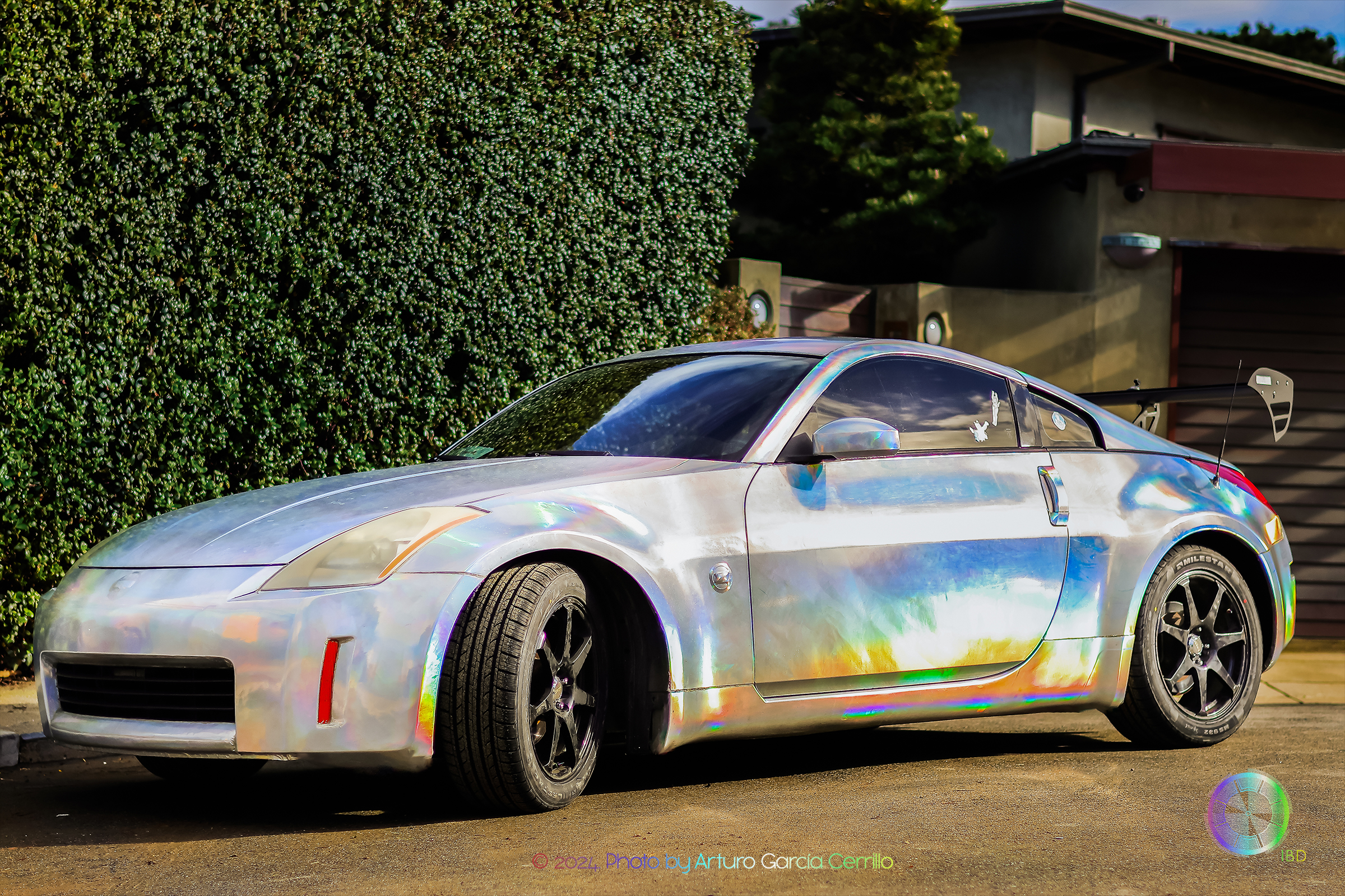 Picture of a holographic wrap nissan 350z under daylight