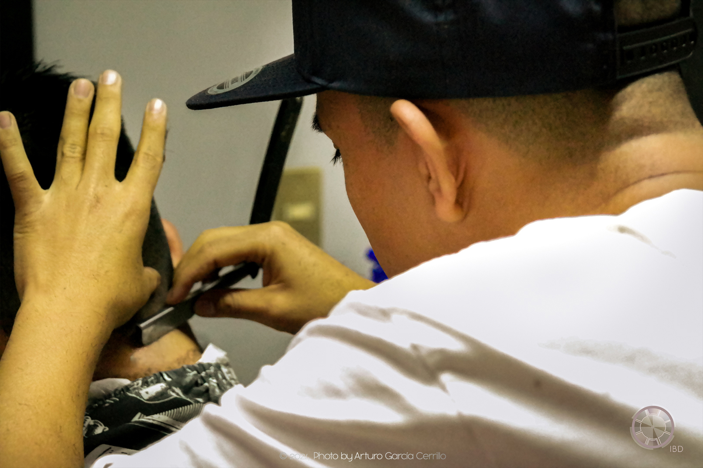 Portrait of guy shaving his customer