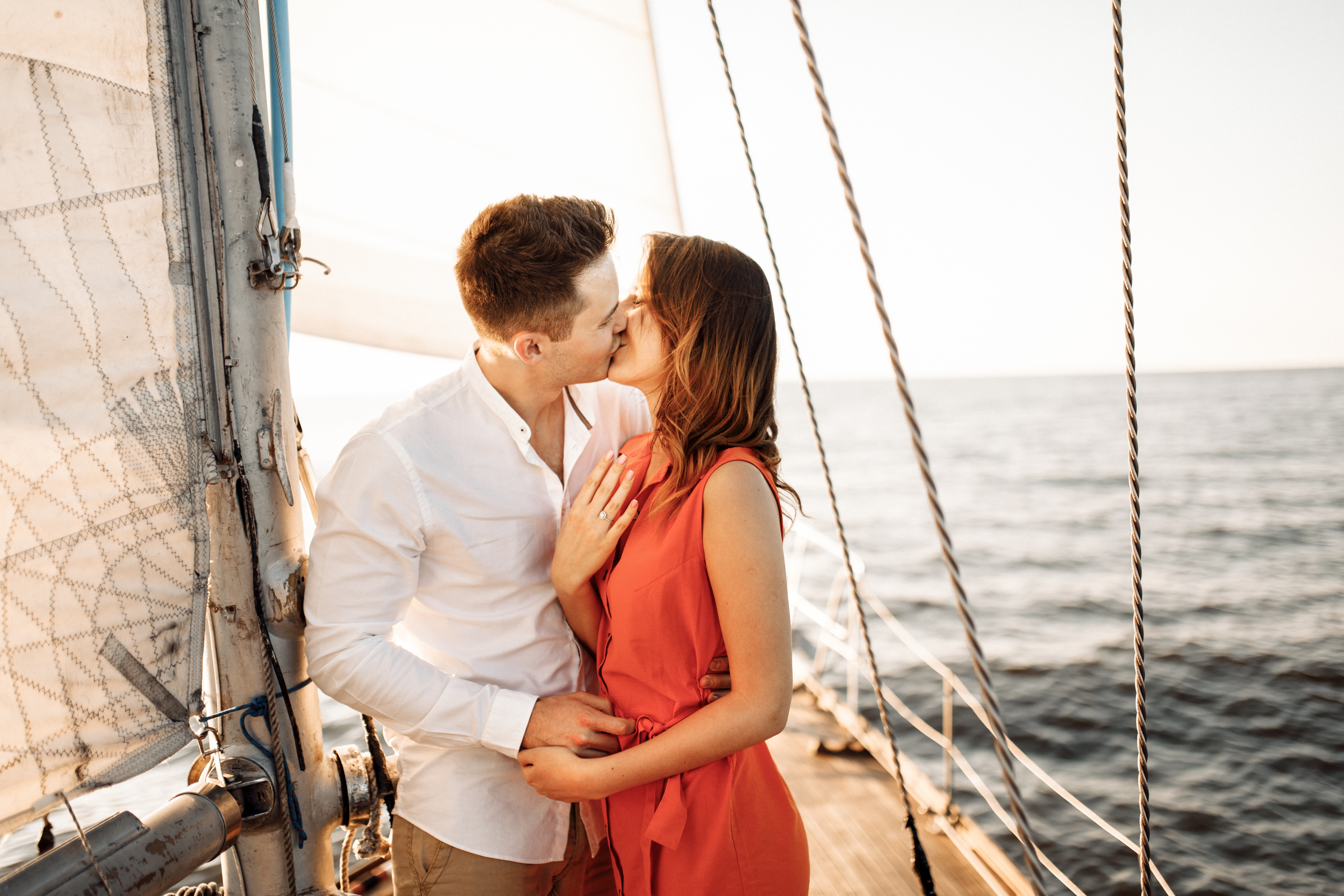 Man proposing marriage in a yacht